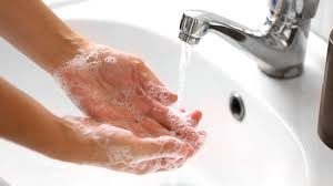 washing hands or using hand sanitiser