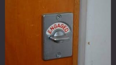 Unsure if the portable toilet is engaged or vacant?